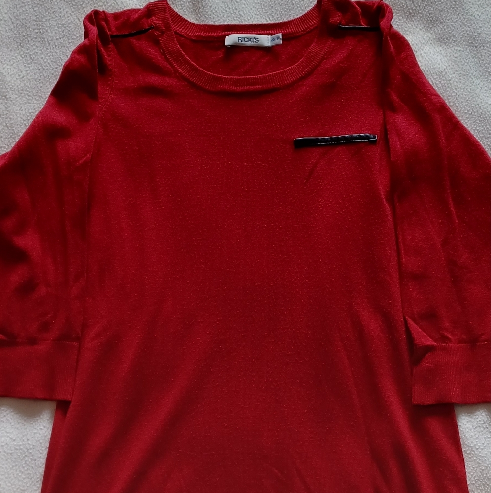Red sweater with faux leather detail